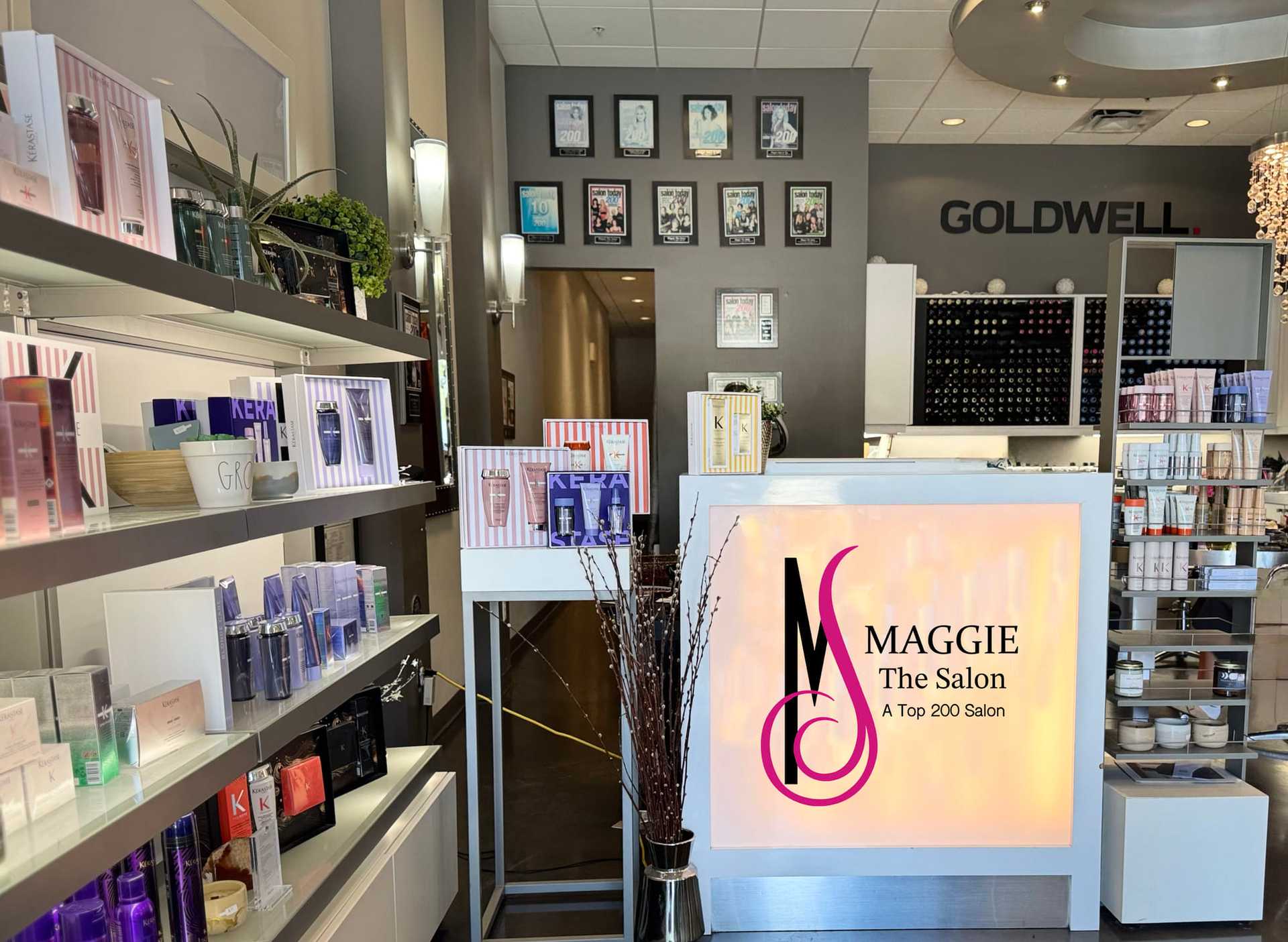 Salon interior with beauty products displayed on shelves and vibrant signage.